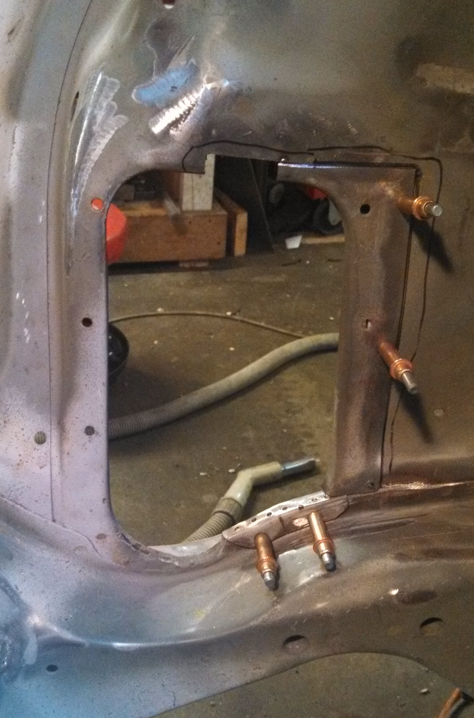 steering arm holes enlarged.jpg