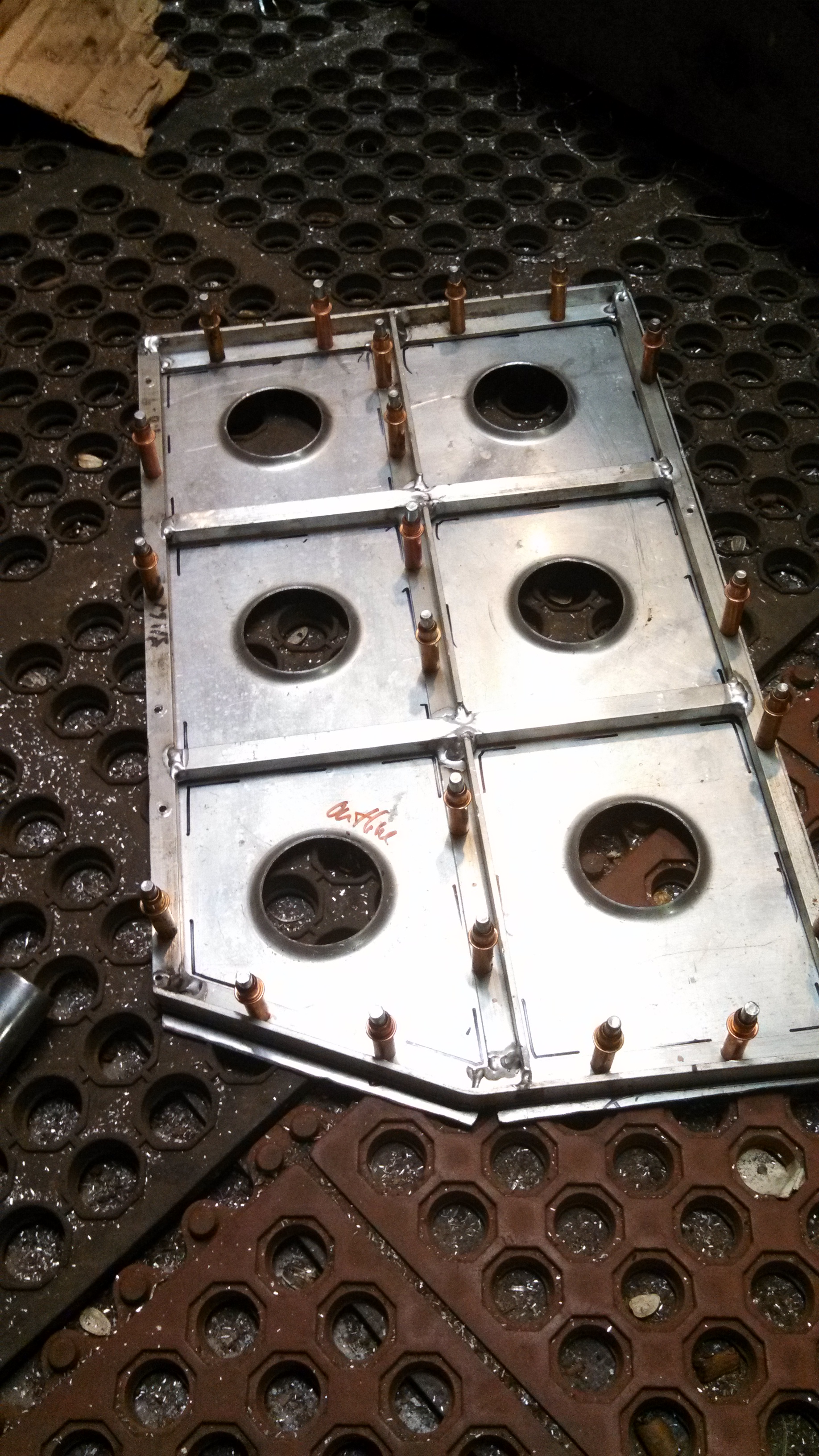 pass footrest with dimple die holes backside.jpg