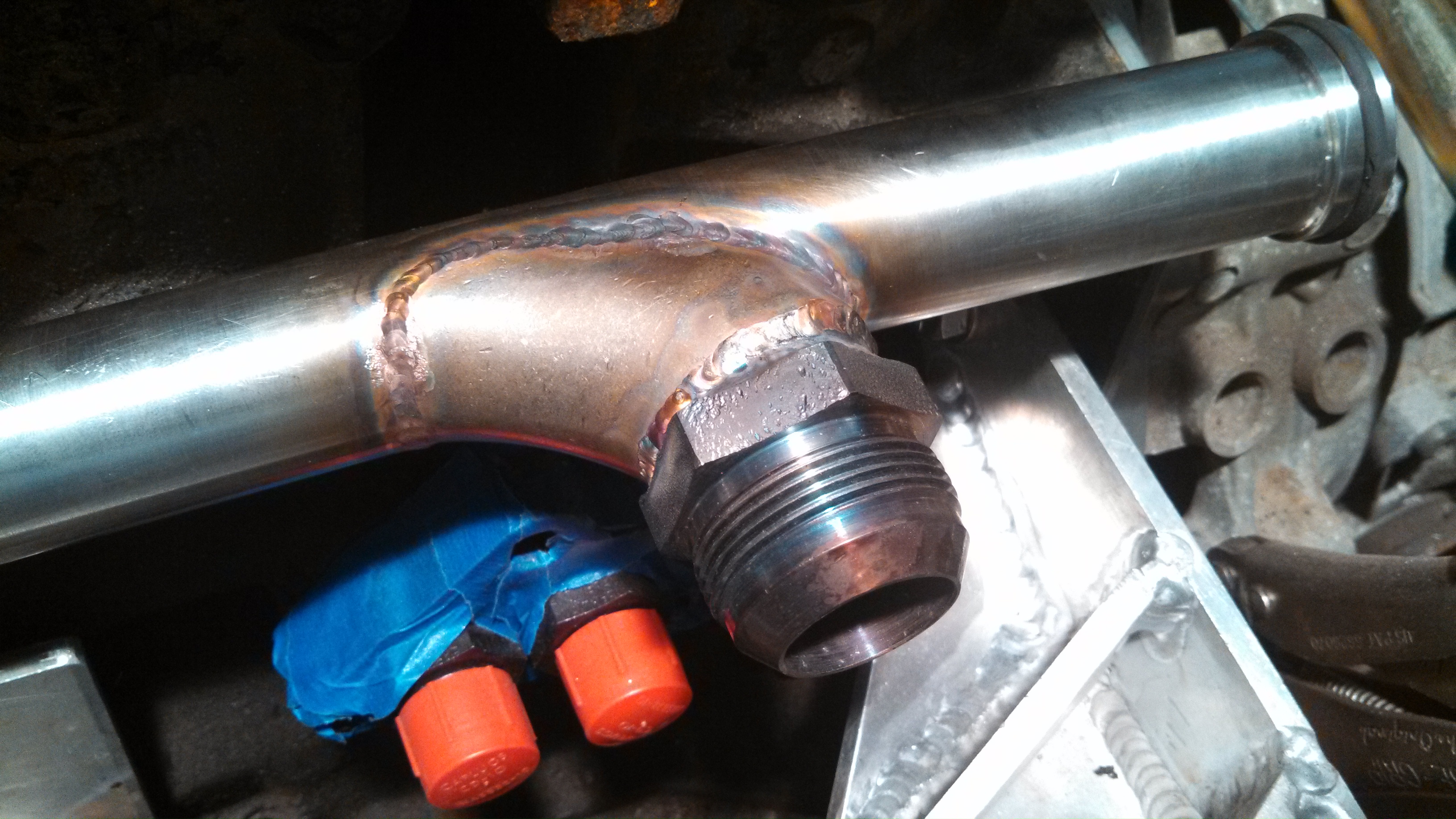 crackpipe bung welded upclose.jpg