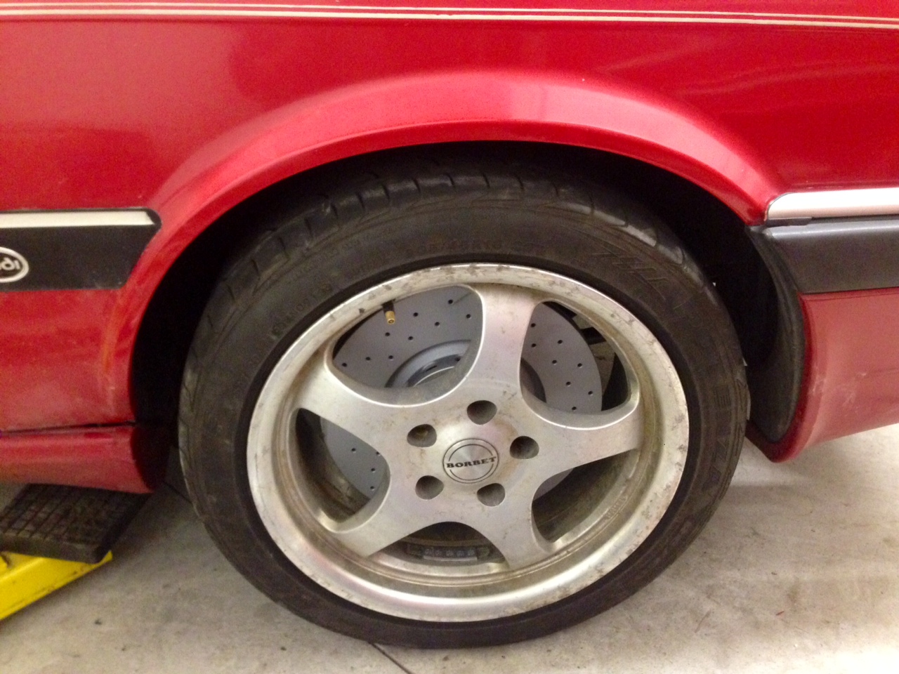 Lt side ball joint + Lt side housing on Rt side so caliper is in the rear of the strut assembly