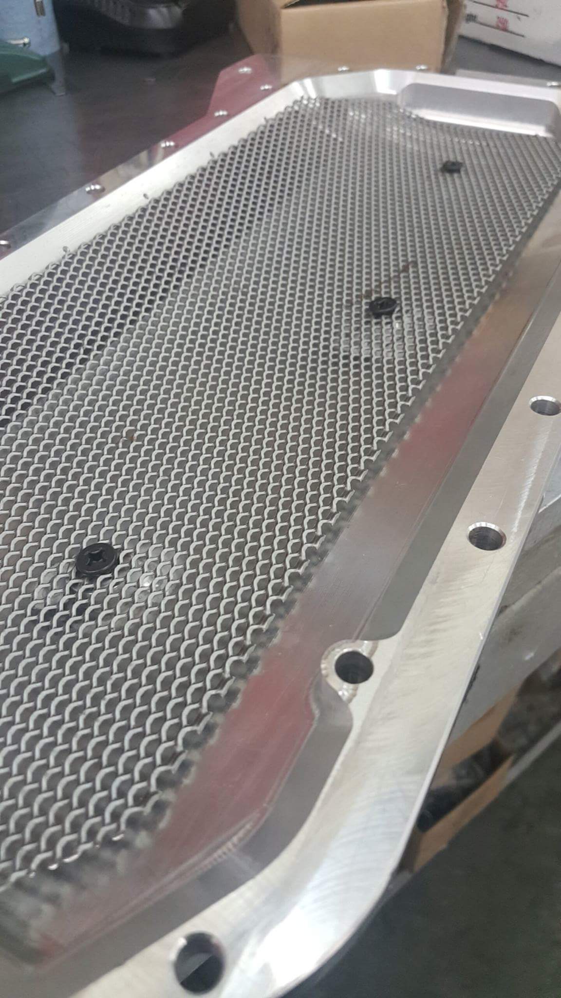 Mesh stuff used to improve oil scavenging