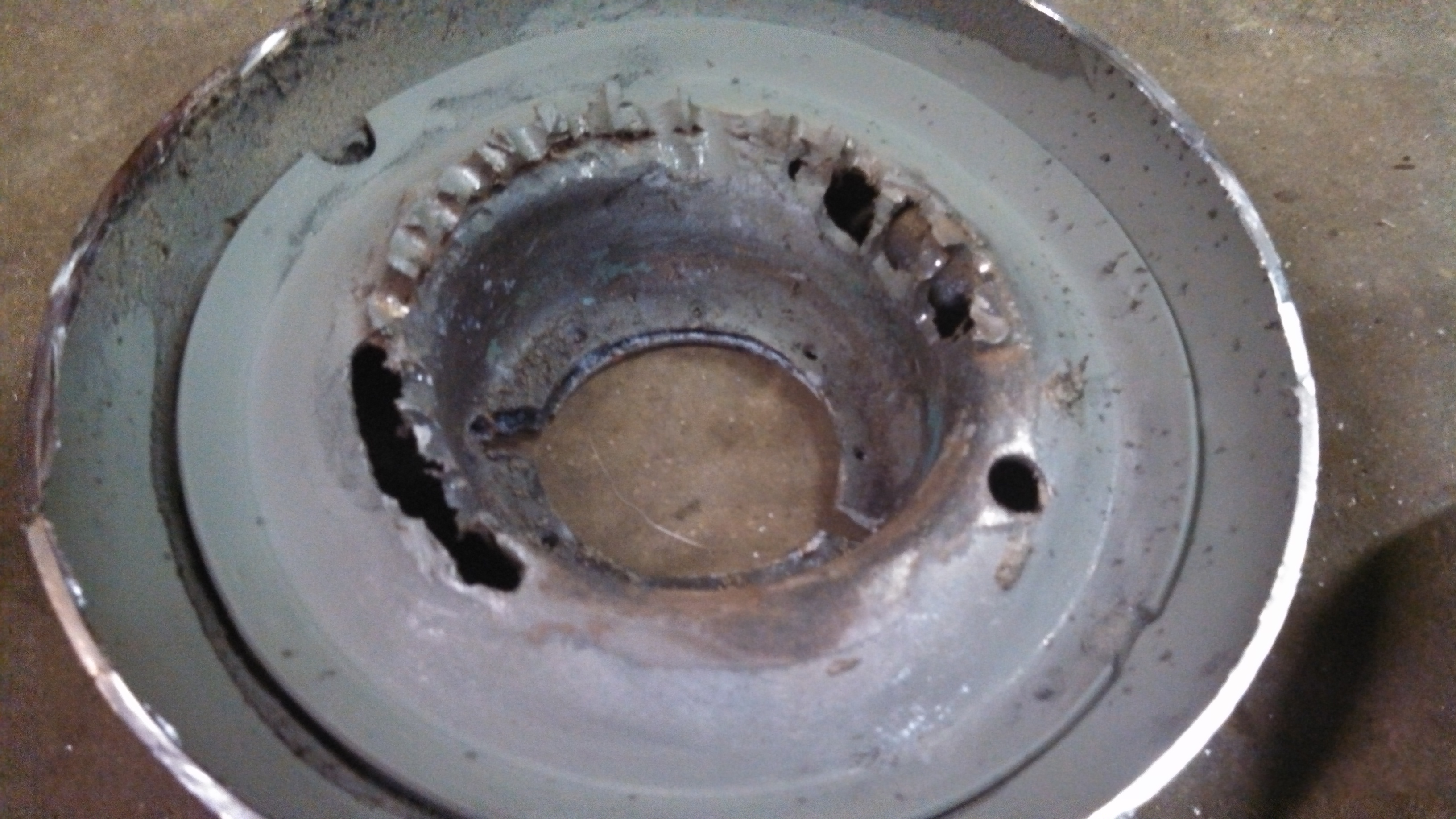 mangled rear pass side strut mount.jpg