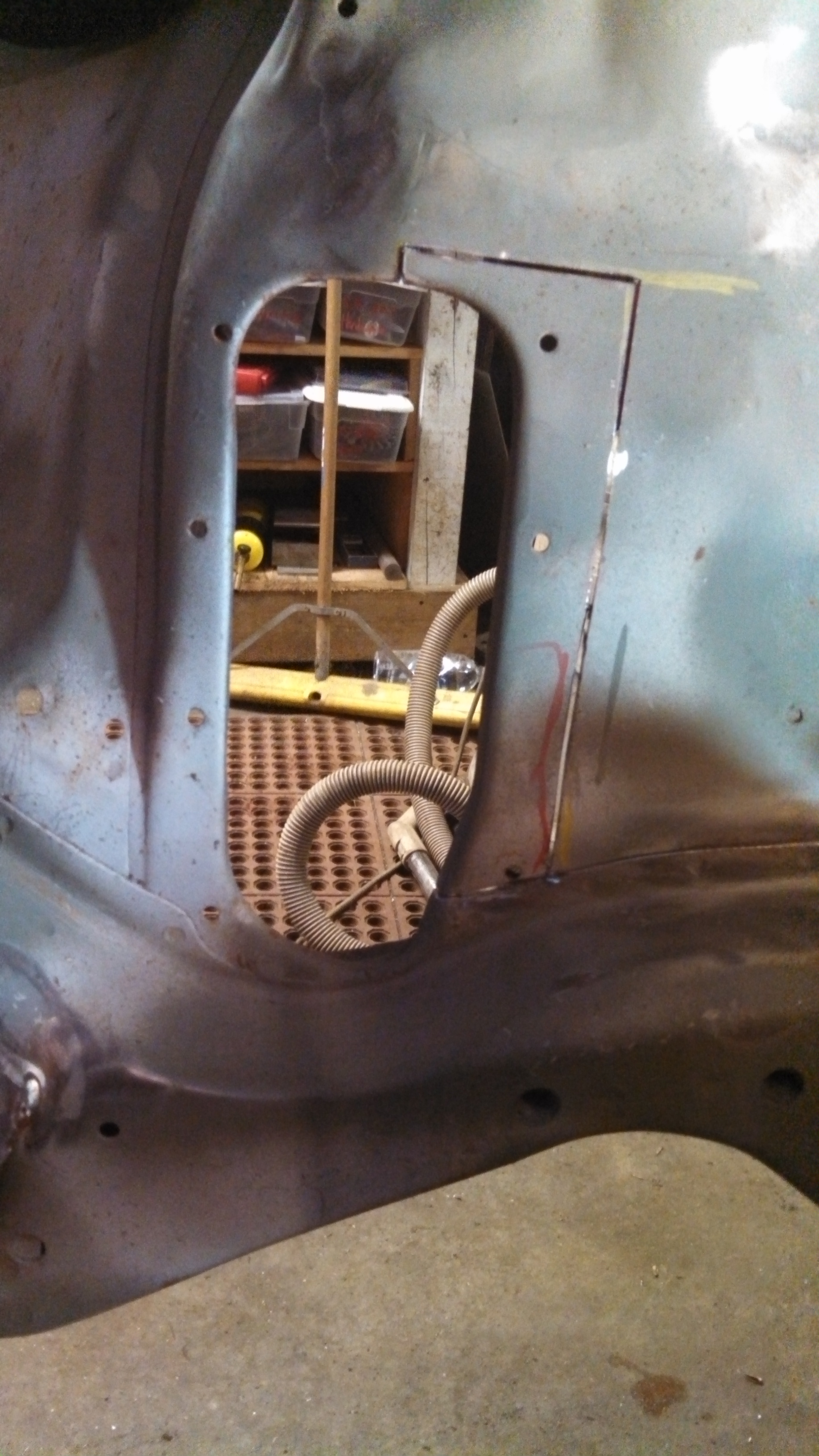 cutting out pass steering arm hole.jpg